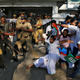 An officer removing members of Kerala Students Union, the student wing of India’s main opposition party, the Indian National Congress, from outside a police station in Kochi on Jan. 03.